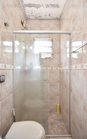 Casa à venda com 320m², 3 quartos e 2 vagasBanheiro