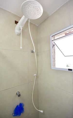 Casa à venda com 320m², 3 quartos e 2 vagasChuveiro do Banheiro