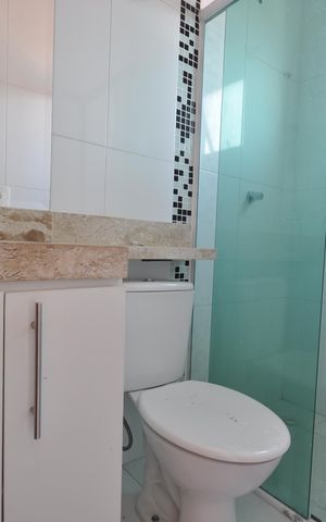Casa de condomínio à venda com 100m², 2 quartos e 2 vagasBanheiro da Suíte 1