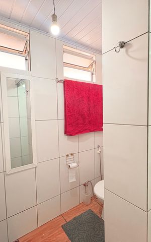 Casa à venda com 93m², 3 quartos e 2 vagasBanheiro Social