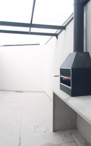 Casa à venda com 110m², 3 quartos e 2 vagasChurrasqueira / fundos da casa