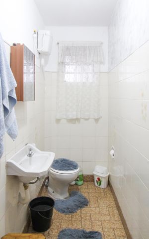 Casa à venda com 107m², 3 quartos e 2 vagas Casa à venda com 107m², 3 quartos e 2 vagasCasa 1 - Banheiro
