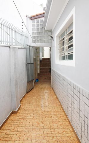 Casa à venda com 107m², 3 quartos e 2 vagas Casa à venda com 107m², 3 quartos e 2 vagasCorredor
