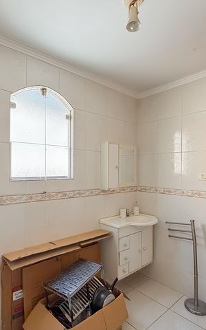 Casa à venda com 95m², 2 quartos e 1 vaga Casa à venda com 95m², 2 quartos e 1 vagaBanheiro da Suíte