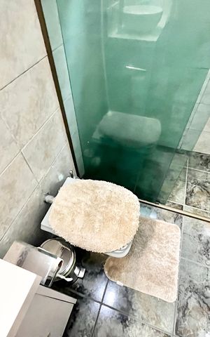 Casa à venda com 200m², 3 quartos e 2 vagas Casa à venda com 200m², 3 quartos e 2 vagasBanheiro da Suíte 1/2