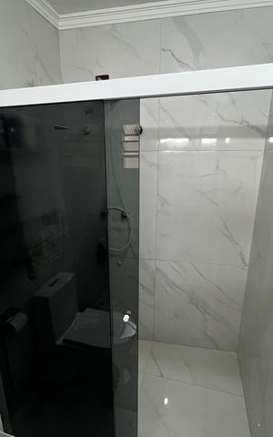 Casa à venda com 200m², 3 quartos e 2 vagas Casa à venda com 200m², 3 quartos e 2 vagasBanheiro da Suíte 3