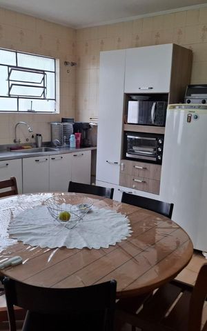 Casa à venda com 200m², 3 quartos e 2 vagas Casa à venda com 200m², 3 quartos e 2 vagasCozinha