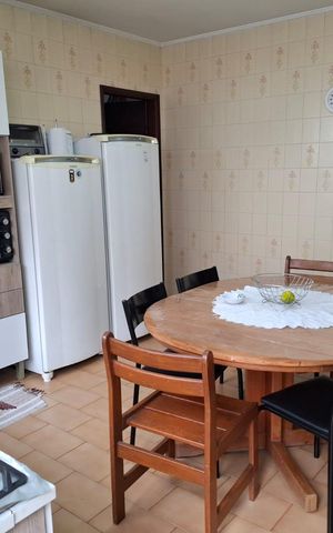 Casa à venda com 200m², 3 quartos e 2 vagas Casa à venda com 200m², 3 quartos e 2 vagasCozinha