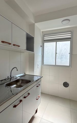 Apartamento à venda com 44m², 2 quartos e 1 vaga Apartamento à venda com 44m², 2 quartos e 1 vagaCozinha e Área de Serviço