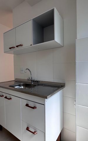Apartamento à venda com 44m², 2 quartos e 1 vaga Apartamento à venda com 44m², 2 quartos e 1 vagaCozinha e Área de Serviço