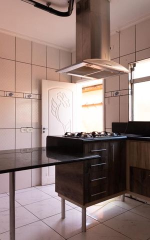 Casa à venda com 125m², 3 quartos e 3 vagas Casa à venda com 125m², 3 quartos e 3 vagasCozinha