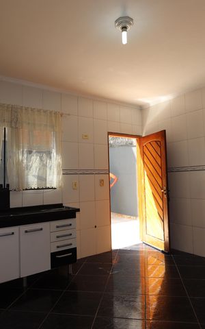 Casa à venda com 200m², 4 quartos e 4 vagasSala e Cozinha Casa 2