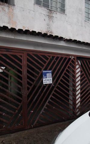 Casa à venda com 216m², 5 quartos e 2 vagasFachada / Placa  