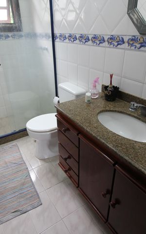 Casa de condomínio à venda com 350m², 4 quartos e 4 vagasBanheiro Social