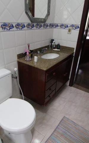 Casa de condomínio à venda com 350m², 4 quartos e 4 vagasBanheiro Social
