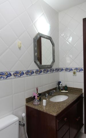 Casa de condomínio à venda com 350m², 4 quartos e 4 vagasBanheiro Social