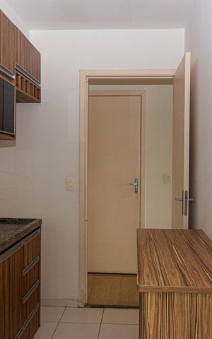 Apartamento à venda com 65m², 2 quartos e 1 vaga Apartamento à venda com 65m², 2 quartos e 1 vagaCozinha e Área de Serviço