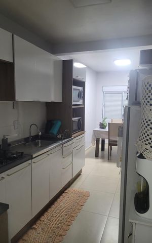 Casa à venda com 75m², 3 quartos e 3 vagas Casa à venda com 75m², 3 quartos e 3 vagasCozinha