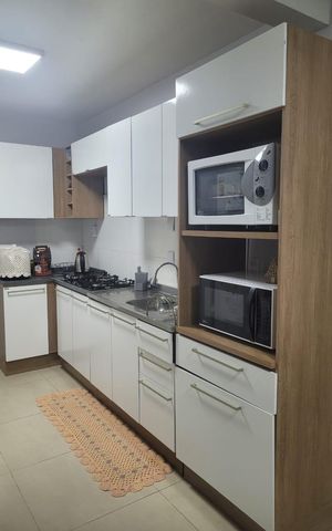Casa à venda com 75m², 3 quartos e 3 vagas Casa à venda com 75m², 3 quartos e 3 vagasCozinha