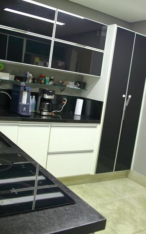 Casa de condomínio para alugar com 250m², 4 quartos e 4 vagasCozinha 