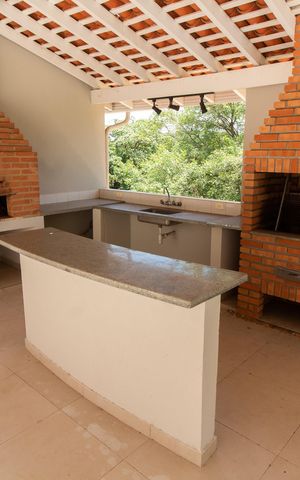 Casa de condomínio à venda com 590m², 4 quartos e 8 vagasÁREA EXTERNA GOURMET FUNDOS