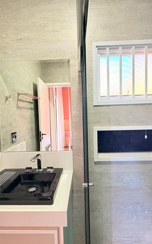 Casa de condomínio para alugar com 362m², 4 quartos e 3 vagasBanheiro da Suíte 3