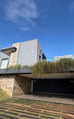 Casa de condomínio para alugar com 362m², 4 quartos e 3 vagasFachada