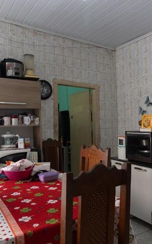 Casa à venda com 70m², 1 quarto e 2 vagas Casa à venda com 70m², 1 quarto e 2 vagasCozinha