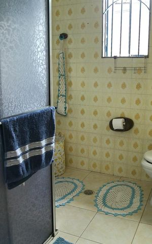 Casa à venda com 267m², 4 quartos e 3 vagasBanheiro Casa 2 