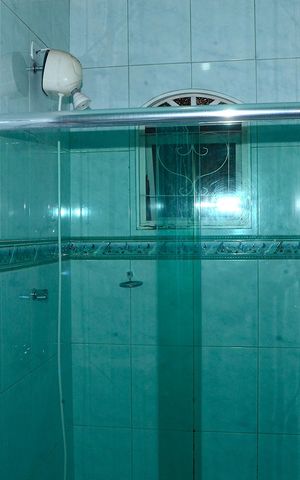 Casa à venda com 167m², 3 quartos e 3 vagasBanheiro Corredor
