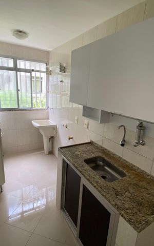 Apartamento à venda com 48m², 2 quartos e 1 vaga Apartamento à venda com 48m², 2 quartos e 1 vagaCozinha e Área de Serviço