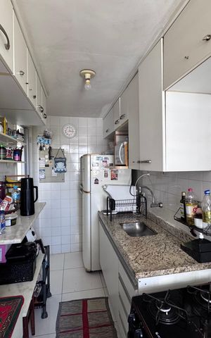 Apartamento à venda com 65m², 2 quartos e 1 vaga Apartamento à venda com 65m², 2 quartos e 1 vagaCozinha e Área de Serviço