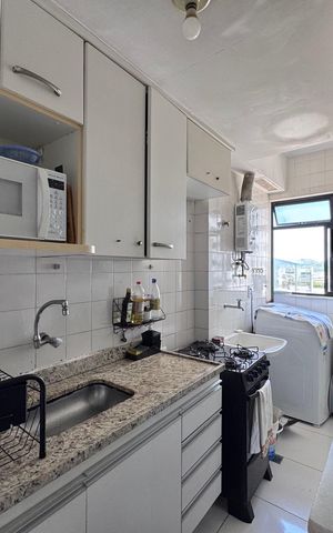 Apartamento à venda com 65m², 2 quartos e 1 vaga Apartamento à venda com 65m², 2 quartos e 1 vagaCozinha e Área de Serviço