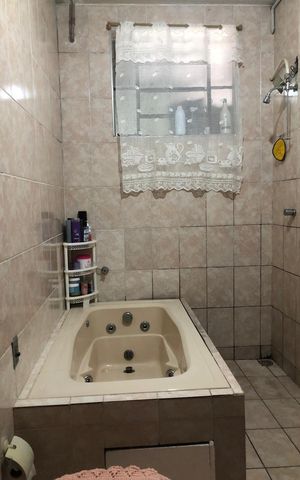 Casa à venda com 159m², 4 quartos e 2 vagas