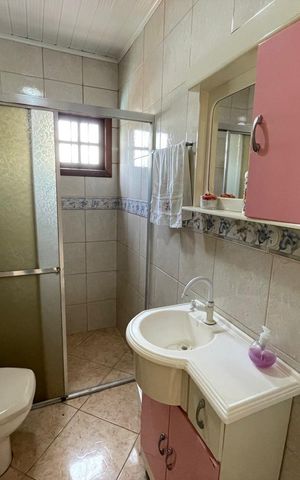 Casa à venda com 300m², 3 quartos e 2 vagas Casa à venda com 300m², 3 quartos e 2 vagasBanheiro da Suíte
