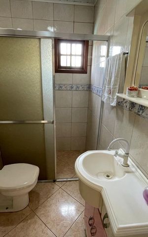 Casa à venda com 300m², 3 quartos e 2 vagas Casa à venda com 300m², 3 quartos e 2 vagasBanheiro da Suíte