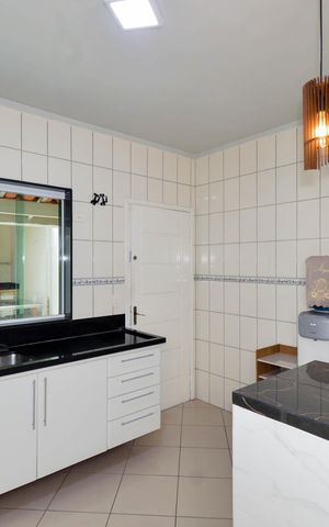 Casa à venda com 88m², 2 quartos e 2 vagas Casa à venda com 88m², 2 quartos e 2 vagasCozinha