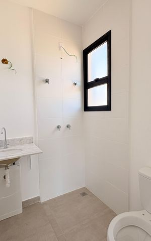Casa de condomínio à venda com 90m², 2 quartos e 2 vagasBanheiro Suíte 1