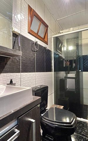 Casa à venda com 170m², 3 quartos e 1 vaga Casa à venda com 170m², 3 quartos e 1 vagaBanheiro