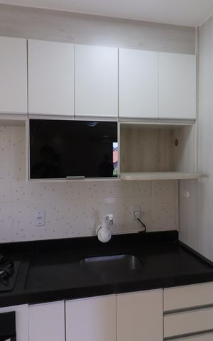 Apartamento à venda com 57m², 2 quartos e 1 vagaCozinha e Área de Serviço