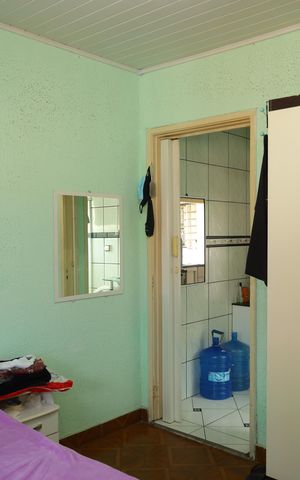 Casa à venda com 150m², 4 quartos e 2 vagasQuarto 1