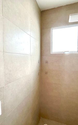 Casa à venda com 120m², 3 quartos e 2 vagas Casa à venda com 120m², 3 quartos e 2 vagasBanheiro da Suíte 2