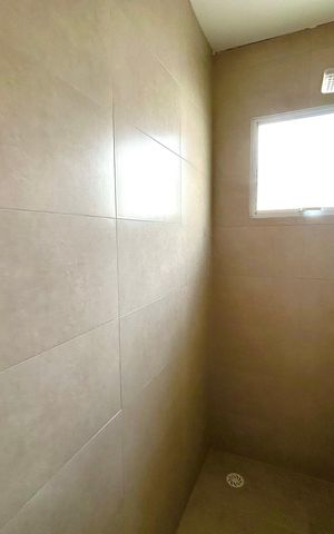 Casa à venda com 120m², 3 quartos e 2 vagas Casa à venda com 120m², 3 quartos e 2 vagasBanheiro da Suíte 1