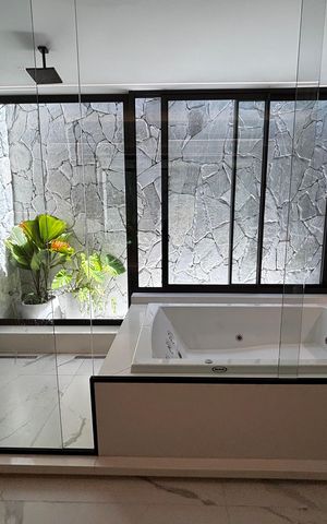 Casa de condomínio à venda com 1500m², 5 quartos e 3 vagas Casa de condomínio à venda com 1500m², 5 quartos e 3 vagasBanheiro da Suíte 4