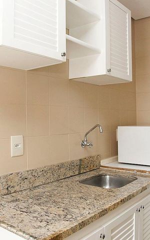 Apartamento à venda com 59m², 1 quarto e 1 vagaCozinha + Área de Serviço