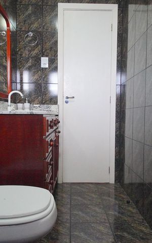 Casa à venda com 290m², 4 quartos e 2 vagasBanheiro da Suíte 2