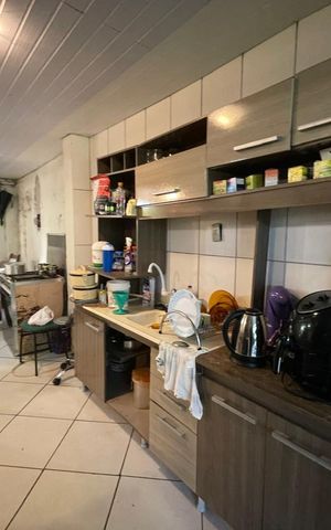 Casa à venda com 55m², 4 quartos e 2 vagasCozinha 1