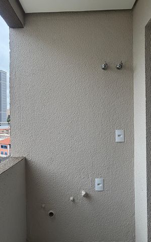 Apartamento para alugar com 56m², 2 quartos e 1 vaga Apartamento para alugar com 56m², 2 quartos e 1 vagaCozinha e Área de Serviço - Varanda