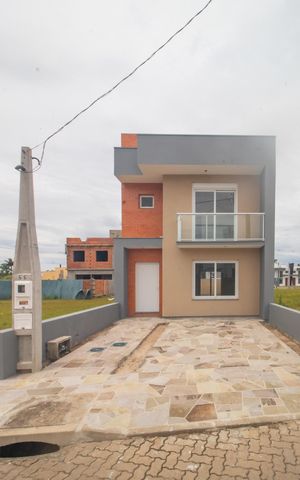 Casa à venda com 112m², 3 quartos e 2 vagas Casa à venda com 112m², 3 quartos e 2 vagasGaragem/Fachada