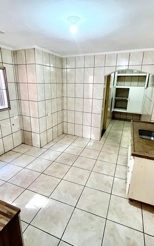 Casa à venda com 92m², 3 quartos e 2 vagas Casa à venda com 92m², 3 quartos e 2 vagasCozinha